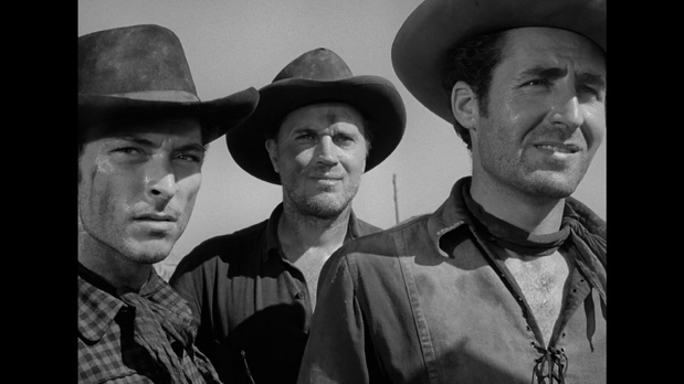 Lee Van Cleef, Robert Wilke et Sheb Wooley dans le film américain High noon (Le train sifflera trois fois, 1952) de Fred Zinnemann