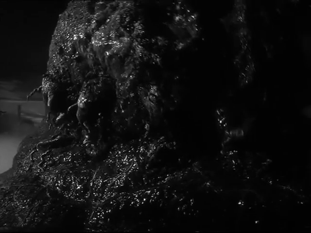 La créature dans le film de sf Quatermass 2 (La marque, 1957) de Val Guest